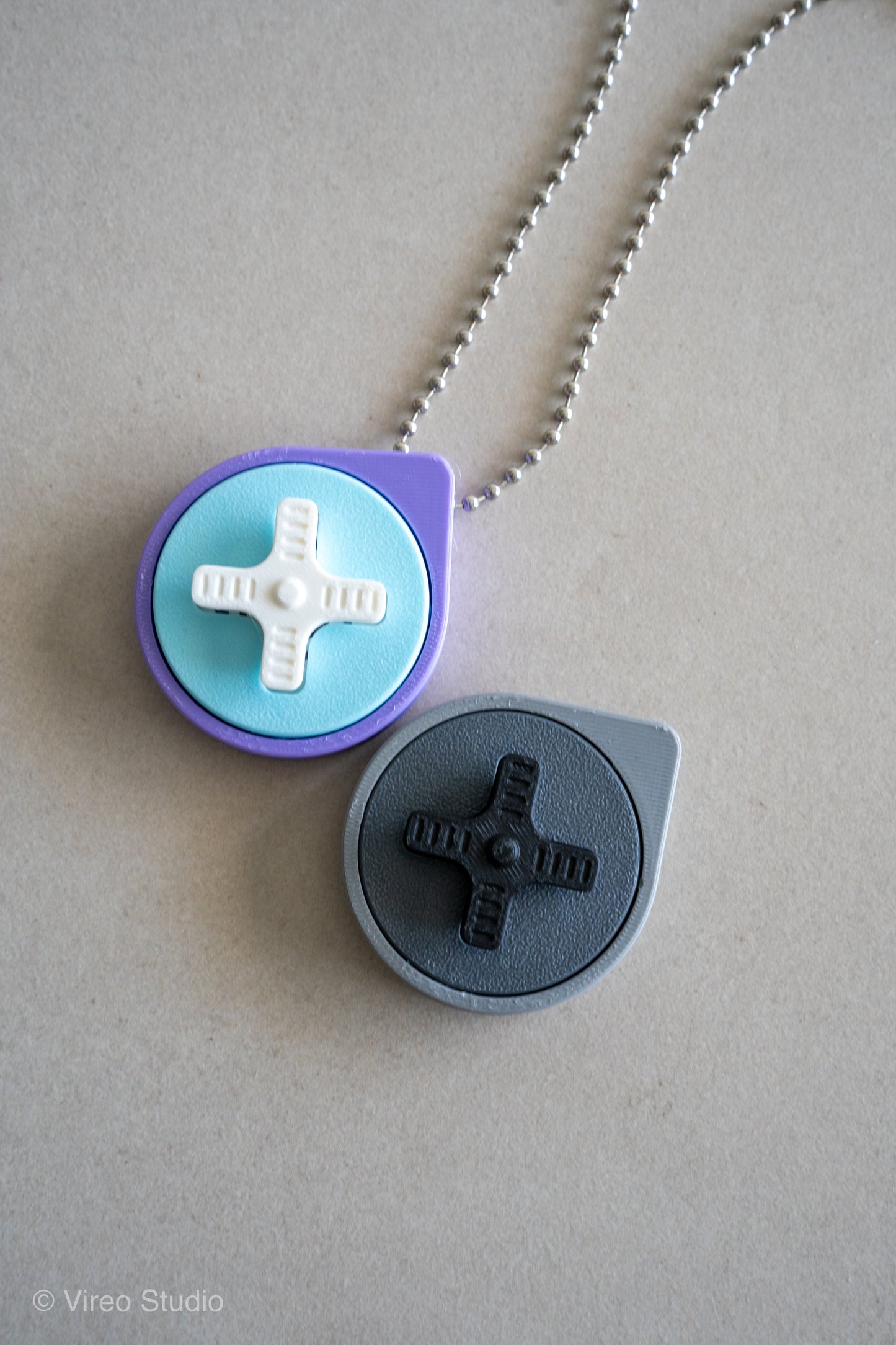 Mini Retro Snap – Fidget Keychain